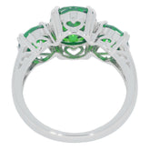 Green garnet sterling silver ring showcasing intricate design and sparkling gemstones for elegance.